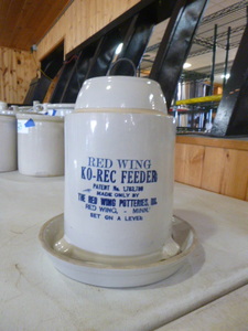 lot 26 image: Vintage Red Wing Ko-Rec Feeder with Bottom Plate