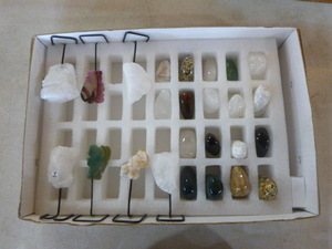 Box of Polished Rocks and Crystals on Stands