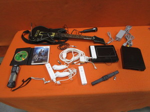 lot 289 image: Nintendo Wii Console, Accessories, Games & Guitar Hero