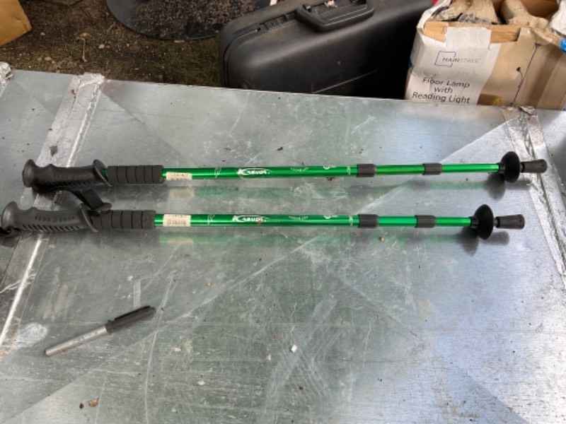 lot 51 image: Adjustable walking sticks Green