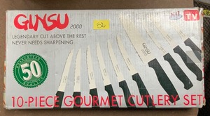 lot 52 image: Ginsu 10-Piece Gourmet cutlery set