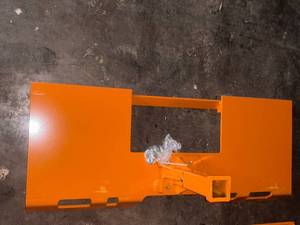 lot 87 image: Wolverine Yitamotor 38 Skid Steer Mount Plate with 2 Removable Trailer Hitch Receiver