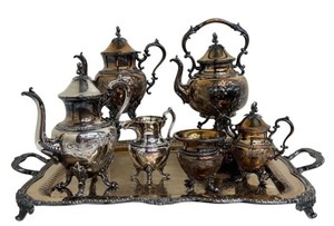 lot 7 image: Vintage Goldfeder Silver Co. Footed Coffee  Tea Service Silver Plate Chased by Hand