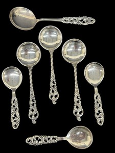 lot 16E image: Seven Vintage Norwegian Sterling Silver Brdrene Mylius Tele Pattern Spoons