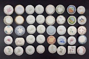 lot 12B image: Assorted Antique Butter Chips  Assorted Vintage Butter Plates