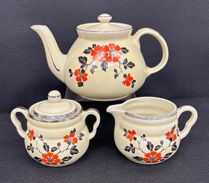 lot 114T image: Vintage Halls Red Poppy CoffeeTea Pot with Creamer Pitcher and Sugar Dish