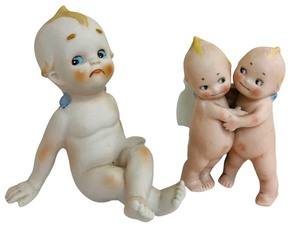 lot 119B image: Vintage Centennial Novelty Cherub and Kewpie Hugger Dolls