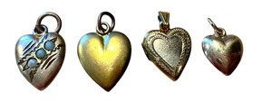 lot 70R image: Four Vintage and Antique Heart Pendants including a 14K Gold Pendant and 10K Pendants