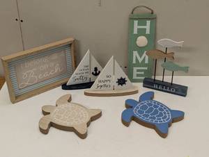 lot 30 image: 7 Piece OceanBeach Decor - Signs, Turtles, Boats
