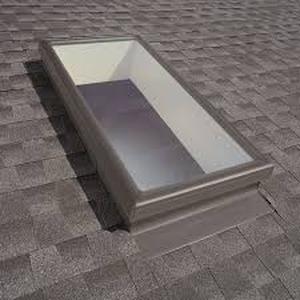 lot 11 image: VELUX 30-12 in. x 30-12 in. Fixed Curb-Mount Skylight with Tempered Low-E3 Glass   Customer Returns See Pictures