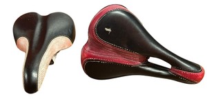 lot 137 image: SCHWINN Cutaway Saddle Seats, BlackRed and BlackPink, Lot of 2 Seats