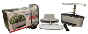 lot 405 image: AeroGarden Portable In Home Garden Bounty Basic