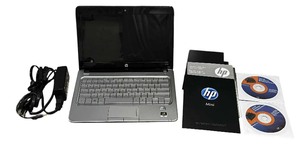 lot 352 image: HP Mini 311 Laptop  HP charger  Discs