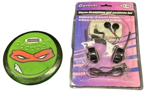 lot 469 image: Teenage Mutant Ninja Turtles (TMNT) portable CD player  Gemini stereo headphone and earphone set