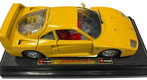 lot 117 image: 118 yellow Ferrari F40 diecast model car