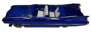 lot 37 image: 143  blue die cast 1959 Cadillac Series 62 convertible