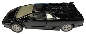 lot 18 image: 124 die cast Black Testors Lamborghini Countach