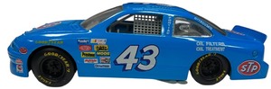 lot 19 image: 124 Bobby Hamilton STP scale 1996 Racing Champions #43