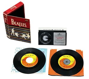 lot 12 image: Beatles Vinyl and VHS Bundle