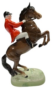 lot 059 image: Beswick Pottery Rearing Horse Huntsman, model number 868, designed by Arthur Gredington