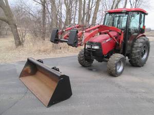 Case DX55 tractor with bucket attac...