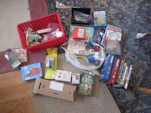 lot 17 image: DVDs, mini Tupperware collectibles,...