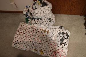 lot 539 image: 2 hand woven plastic bag rugs blan...