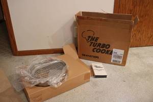lot 548 image: THE TURBO COOKER new in box...