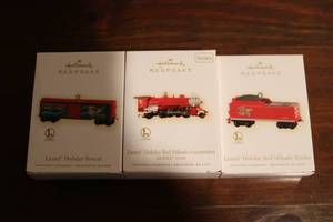 lot 560 image: Hallmark Keepsake ornaments trains...