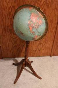 Globe with wooden stand...
