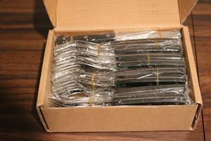 lot 673 image: 40 Piece Flatware set new in box...