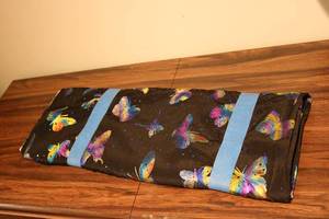 lot 692 image: 10yards of black metallic butterfly...