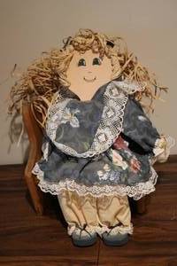 lot 699 image: wooden doll on wooden bench...