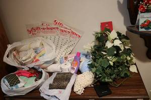 lot 704 image: Crafting lot fabric, yarn, and more...