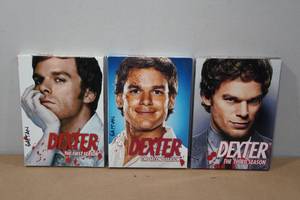 lot 202 image: Dexter DVD Sets -1st, 2nd & 3rd Seasons