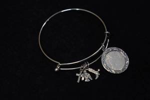 lot 207 image: Silver Toned Charm Bracelet with Buffalo Nickel Coin Charm