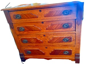 lot 22 image: Art Deco Pine Four Drawer Dresser On Casters
