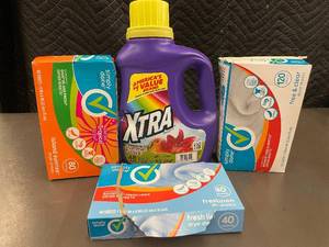 lot 34 image: Assorted Laundry Care Products Including Detergent and Dryer Sheets