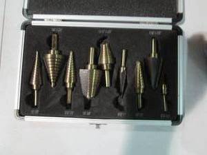 lot 66 image: 9pc cased lot of assorted size Tita...