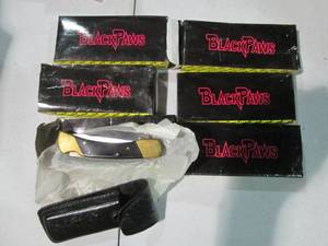 lot 79 image: Black Paws 5in folding lock back po...
