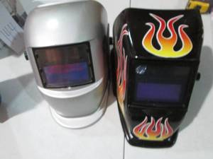 lot 145 image: Pair of auto darkening welding helm...
