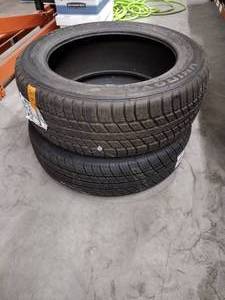 lot 32 image: 2 New Uniroyal tires different sizes tiger paw 20570R 16 97H and 21555R 18 95T