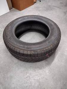 lot 37 image: One New Michelin Defender Tire TH 22560 R16