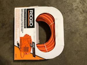 lot 20 image: RIDGID 14 in. 50 ft. Lay Flat Air Hose   Customer Returns See Pictures