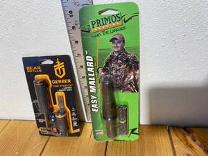lot 50-B2025 image: New Primos Hunting Easy Mallard Call and New Bear Grylles Fire Starter