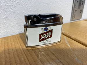 lot 60-B2025 image: Vintage, Working BrotherLite Shlitz Beer Lighter
