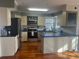 lot 1 image: Kitchen Cabinets - Metal and Wood - with Formica Countertops - Removed and Ready for Pickup