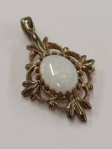 lot 61R image: Opal Pendant in Decorative Sterling Silver Setting