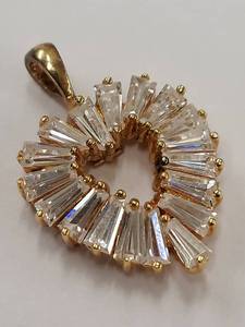lot 87R image: Gold-Tone Pendant with Brilliant Cut Stones