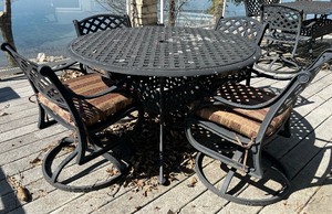 lot 38 image: Metal Patio Table with Four Swivel Rocker Chairs